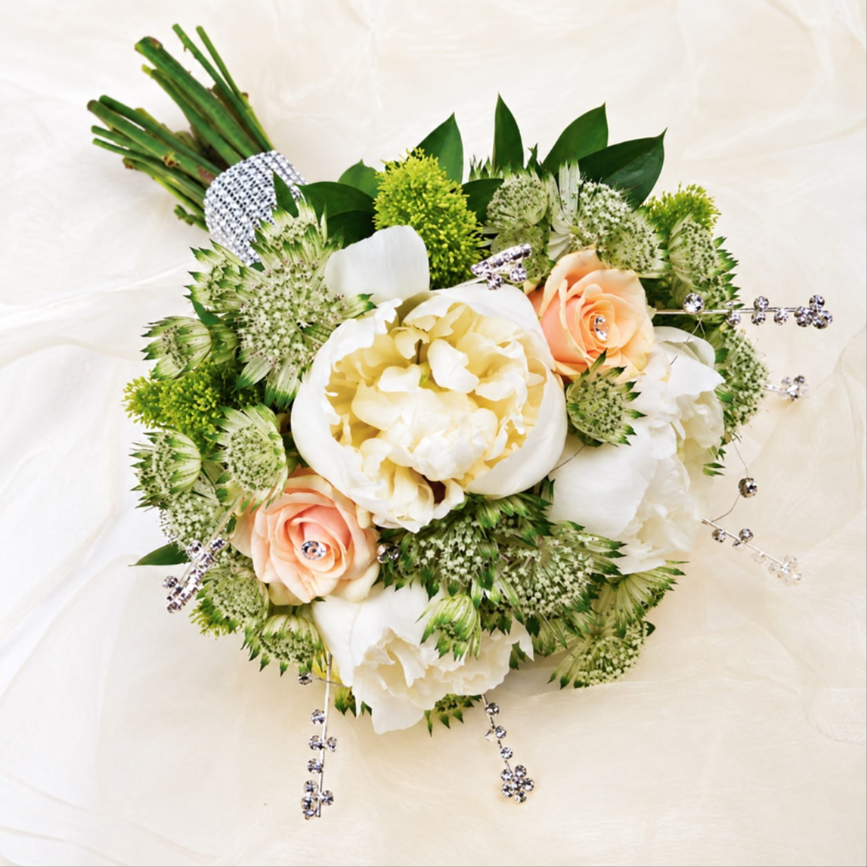 Bridal bouquet of peonies, roses and astrantia