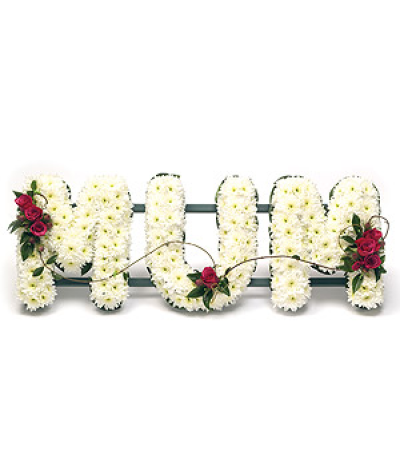 Mum Lettering - White Chrysanthemum Mum lettering on a stand with red Rose sprays and complementary foliage edge.

Delivering in Norwich and surrounding areas (please check on our delivery page for areas we cover)

Our funeral designs are created with care and hand delivered to the funeral directors.