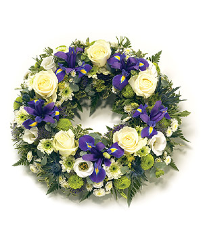 Traditional Wreath - Open round wreath with natural foliage including Roses, Chrysanthemums and complementary foliage. Available in 6 delicate colour schemes.

Delivering in Norwich and surrounding areas (please check on our delivery page for areas we cover)

Our funeral designs are created with care and hand delivered to the funeral directors.